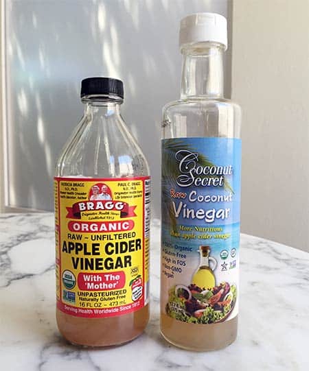 apple cider and coconut vinegar bottles