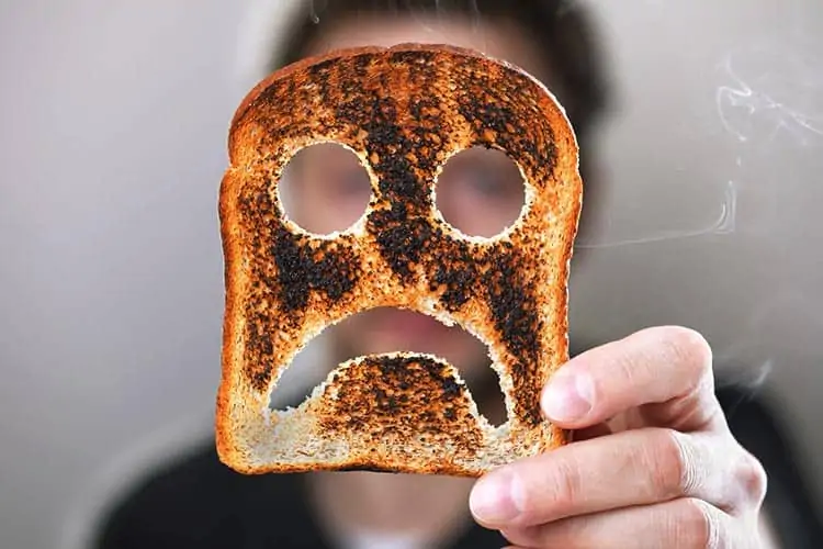 burnt toast with frown face