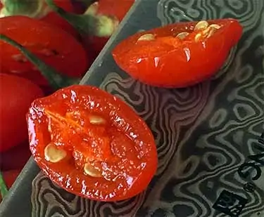 close up of fresh goji cut in half