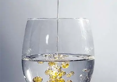 oil being poured in water