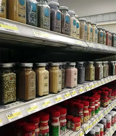 dried spice bottles at grocery store