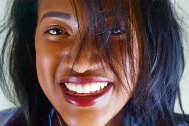 Indian woman smiling with pretty teeth