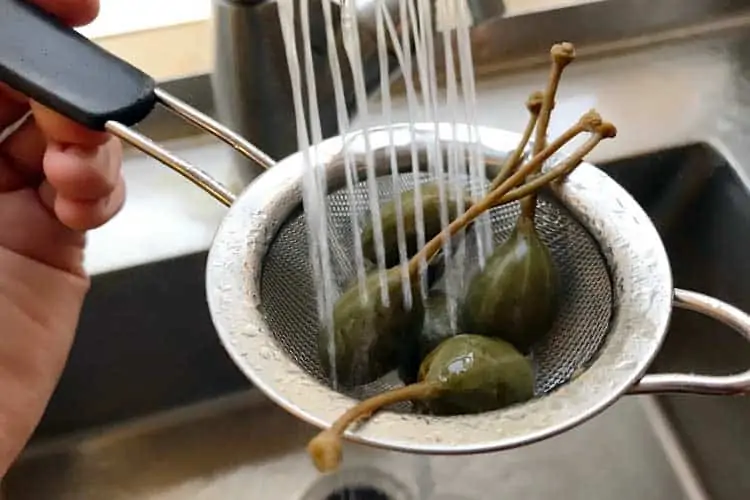 rinsing brine off caper berries before eating