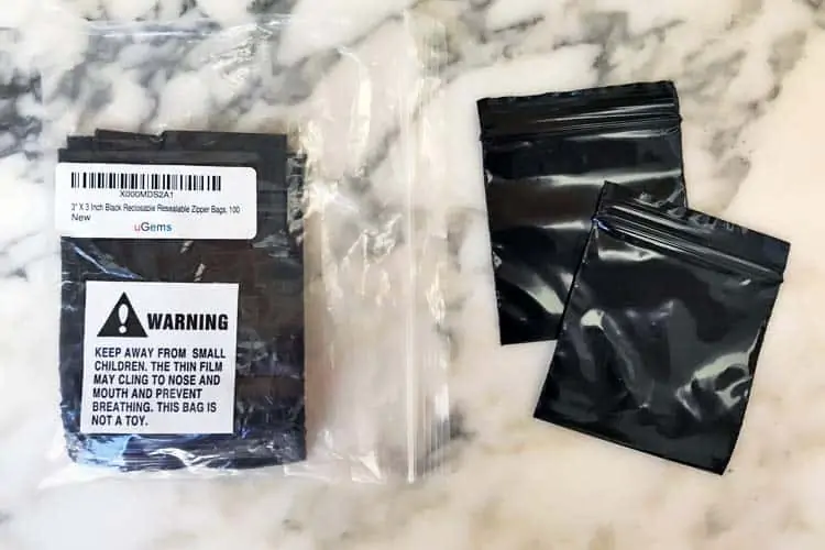 small black plastic zip lock bags