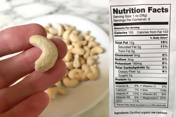 cashew nutrition facts label with photo of hand holding raw organic nut