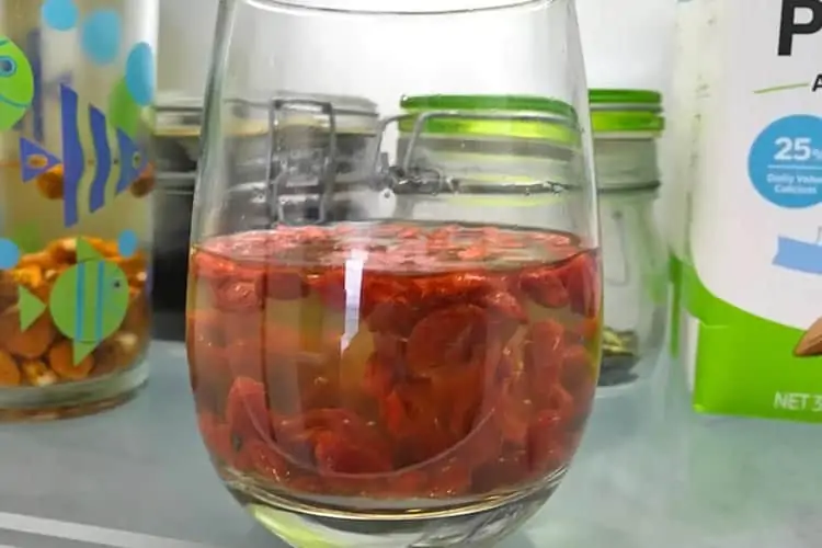 soaking goji in water to plump them up