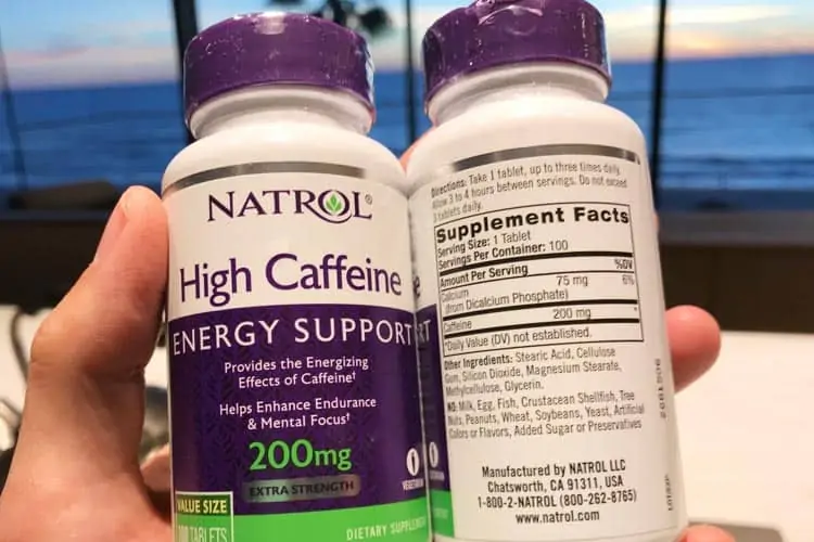 Natural caffeine tablets bottle with dosage instructions